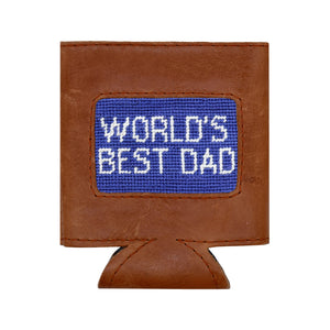 Introducing the Smathers & Branson World's Best Dad Can Cooler—a brown Italian leather can holder featuring a hand-stitched blue needlepoint patch emblazoned with "WORLD'S BEST DAD" in white, offering a premium, artisanal touch.