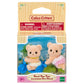 Two fuzzy Biscuit Bear twins in diapers—one riding a blue scooter, the other standing next to a tricycle—come packaged in a Calico Critters box labeled “Biscuit Bear Twins” with a choking hazard warning for ages 3 and up.