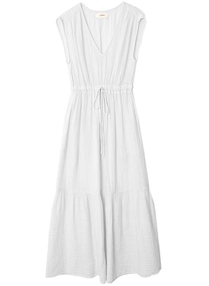 The Xirena Rosalie Dress by Xirena is a white, sleeveless, knee-length dress with a V-neck and an elasticized drawstring waist, featuring a gathered skirt.