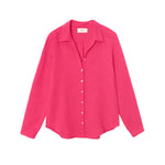 The Xirena Scout Cotton Gauze Shirt, shown flat against a white background, is a bright pink long-sleeve button-up crafted from washed cotton gauze and features a lightweight button-front design with a classic shirttail hem.