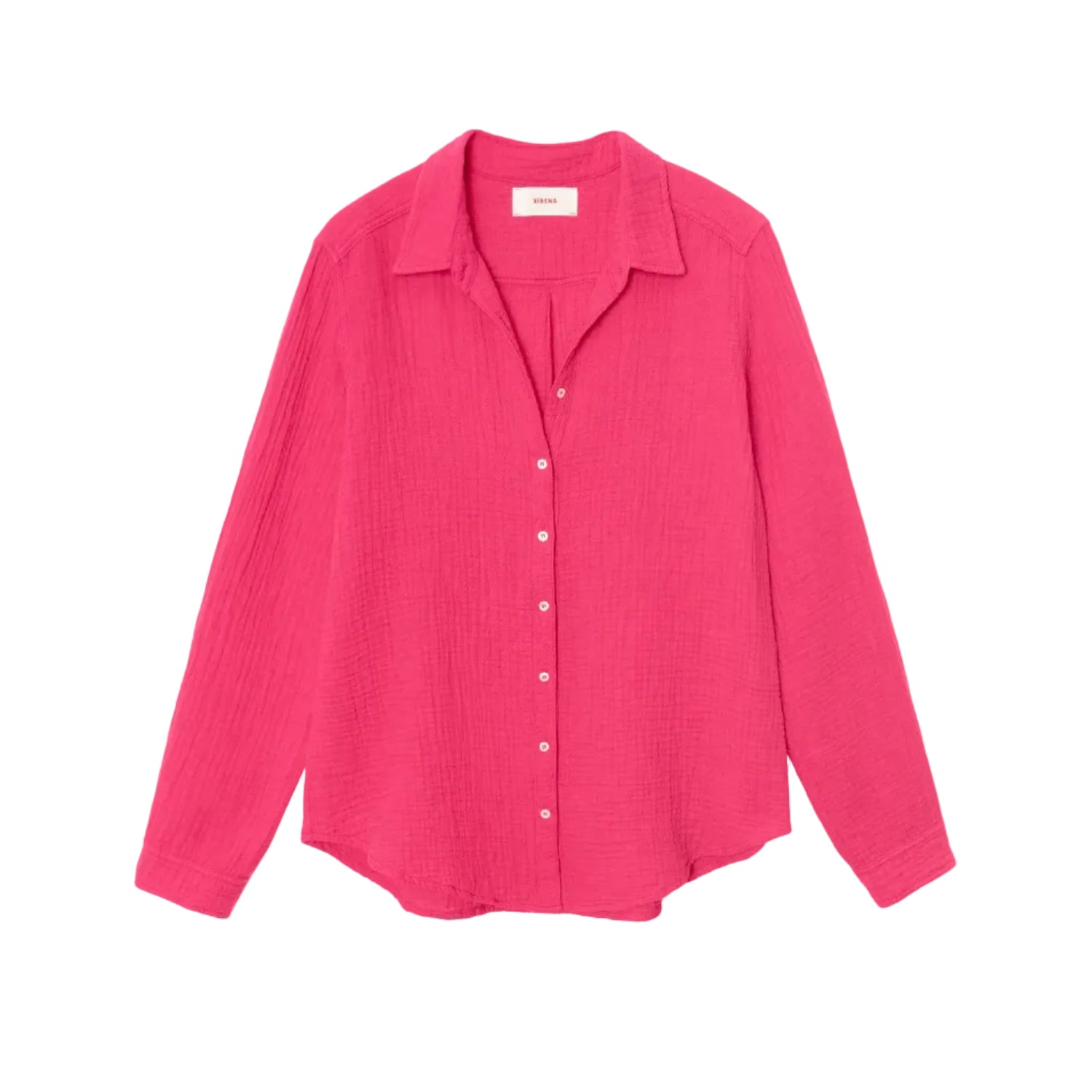 The Xirena Scout Cotton Gauze Shirt, shown flat against a white background, is a bright pink long-sleeve button-up crafted from washed cotton gauze and features a lightweight button-front design with a classic shirttail hem.