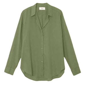 A long-sleeved, olive green Xirena Beau Shirt with a collar and a slightly curved hem. Crafted from Cotton Poplin, the Boyfriend shirt is laid flat.