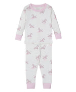 The Kissy Kissy Dreamy Zebras Toddler Pajama Set features white and pink hues with unicorn patterns. Made from soft Pima cotton, it includes long sleeves and pants with ribbed cuffs, offering kids ultimate comfort for a cozy night's sleep.