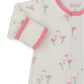 The Kissy Kissy Baby Girls' Flamingo Love Convertible Gown features pink trim, a pink and green flamingo print, soft Pima cotton, and front snap buttons.