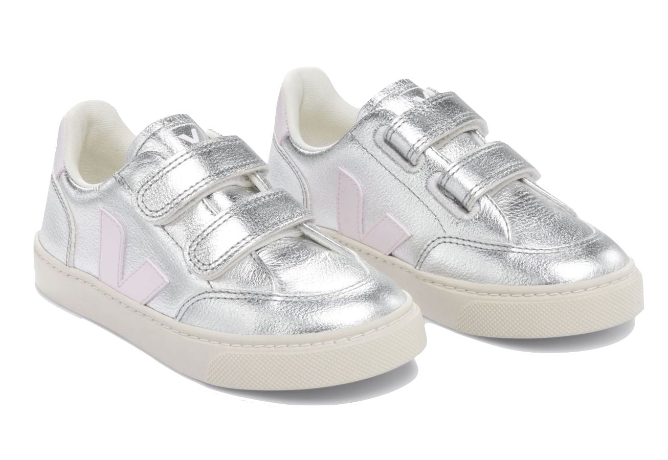 Pair of Veja Junior V-12 Velcro Sneakers with pink accents and Amazonian rubber soles.