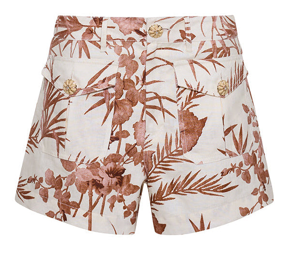 The Cara Cara Xenia Short is a high-waisted women's mini featuring a bold tropical leaf and flower print, front patch pockets with raffia buttons, and a classic button fly.