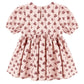 The Rylee & Cru Baby Girls' and Girls' Rose Dress features short sleeves, a gathered waist, and a red floral print, shown from the back for Western-inspired style.