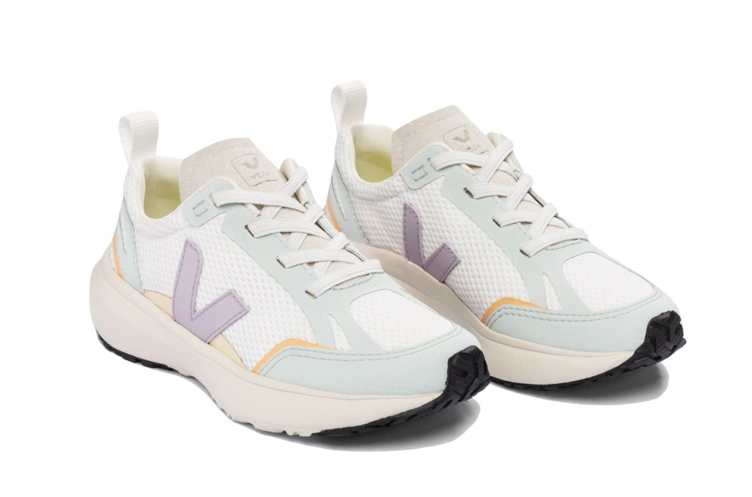 A pair of Veja Junior Canary Alveomesh Sneakers by Veja, featuring a white athletic design with pastel lavender and light blue accents, thick soles, and a textured upper made from sustainable materials like recycled polyester.