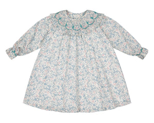 The Antoinette Yse Blue Floral Long Sleeve Bishop Dress features a ruffled embroidered collar and gathered cuffs in soft blue and pink florals—a charming spring outfit for your little one.