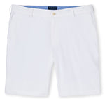 A pair of Peter Millar Surge Performance Shorts for men with a button closure, a blue inner waistband, and made from easy-care, water-resistant material.