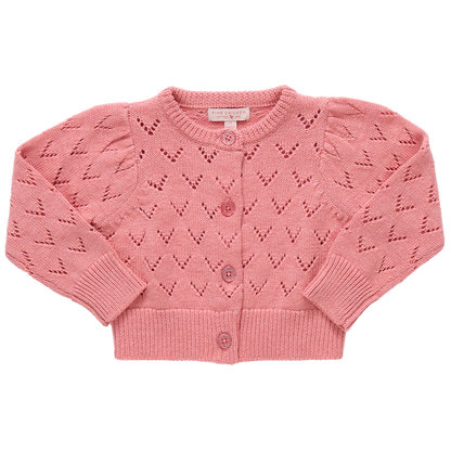The Girls' Connie Sweater by Pink Chicken is a pink pointelle cardigan with heart-shaped eyelets, long sleeves, ribbed cuffs and hem, and glitter button closure on the front.