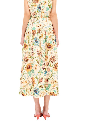 A person shown from the back against a white background wearing the Ulla Johnson Theodora Skirt.