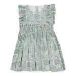 The Kidiwi Baby Girls' and Girls' Clarisse Smocked Dress features a sleeveless design in light green and white with floral and geometric patterns, ruffled shoulders, and a gathered waist in soft cotton poplin, shown on a plain white background.