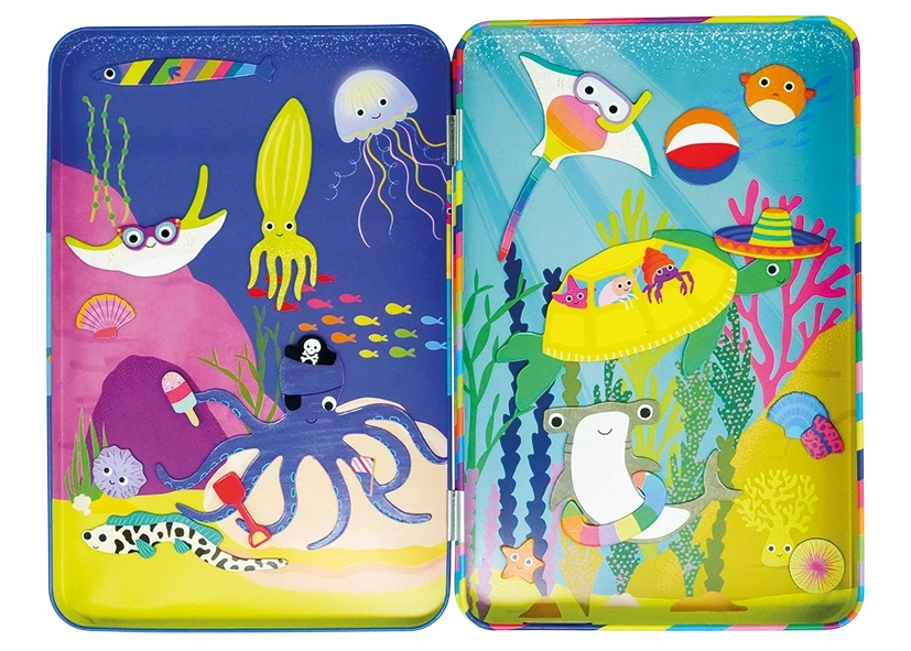 The Floss and Rock Ocean Magnetic Playtime Tin includes two colorful trays decorated with playful cartoon sea creatures—such as an octopus, ray, squid, jellyfish, fish, and crabs—set against vibrant underwater scenes filled with coral and plants. Crafted from recycled materials, this fun playset is both eco-friendly and imaginative.