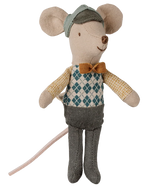 Maileg Driver Mouse, Little Brother: a stuffed toy mouse dressed in a blue diamond-patterned vest, yellow bow tie, green hat, yellow shirt, and gray pants, featuring a long pink tail.