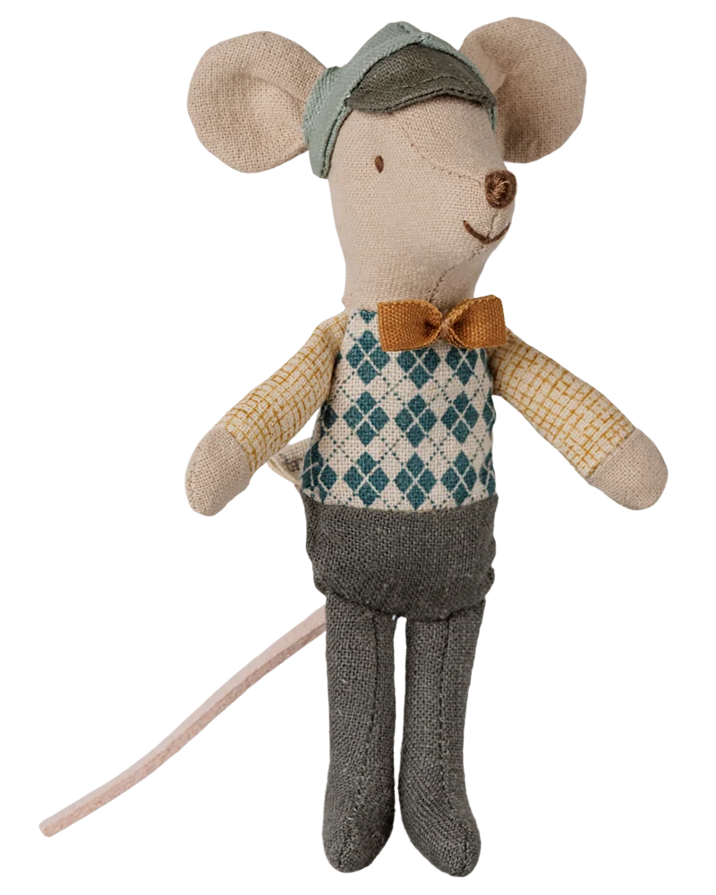 Maileg Driver Mouse, Little Brother: a stuffed toy mouse dressed in a blue diamond-patterned vest, yellow bow tie, green hat, yellow shirt, and gray pants, featuring a long pink tail.