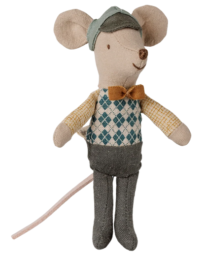 Maileg Driver Mouse, Little Brother: a stuffed toy mouse dressed in a blue diamond-patterned vest, yellow bow tie, green hat, yellow shirt, and gray pants, featuring a long pink tail.