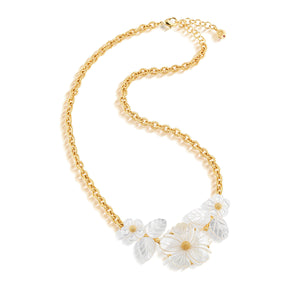 The Juliska Capucine De Wulf Mermaid Garden Bouquet Necklace is a gold link chain with clear, clustered flower and leaf-shaped pendants as its centerpiece.