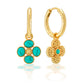 The Berry Clover Hoop Earrings with Double Sided Charm from Juliska Capucine De Wulf feature one earring with four turquoise stones in a floral design and the other with a hammered gold hoop, clover charm, and turquoise center.