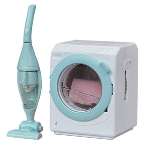 The Calico Critters Laundry & Vacuum Cleaner set features a pastel blue and white toy washing machine with a pink towel inside, placed next to a matching toy vacuum cleaner—ideal as charming dollhouse accessories.