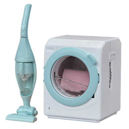 The Calico Critters Laundry & Vacuum Cleaner set features a pastel blue and white toy washing machine with a pink towel inside, placed next to a matching toy vacuum cleaner—ideal as charming dollhouse accessories.
