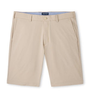 The Peter Millar Matlock Seersucker Performance Short is a beige pair with belt loops, front pockets, and a button closure, shown against a white background.