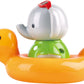 A Spin Splash & Swim Elephant color-changing bath toy in a rubber duck boat for bath time fun by Hape.