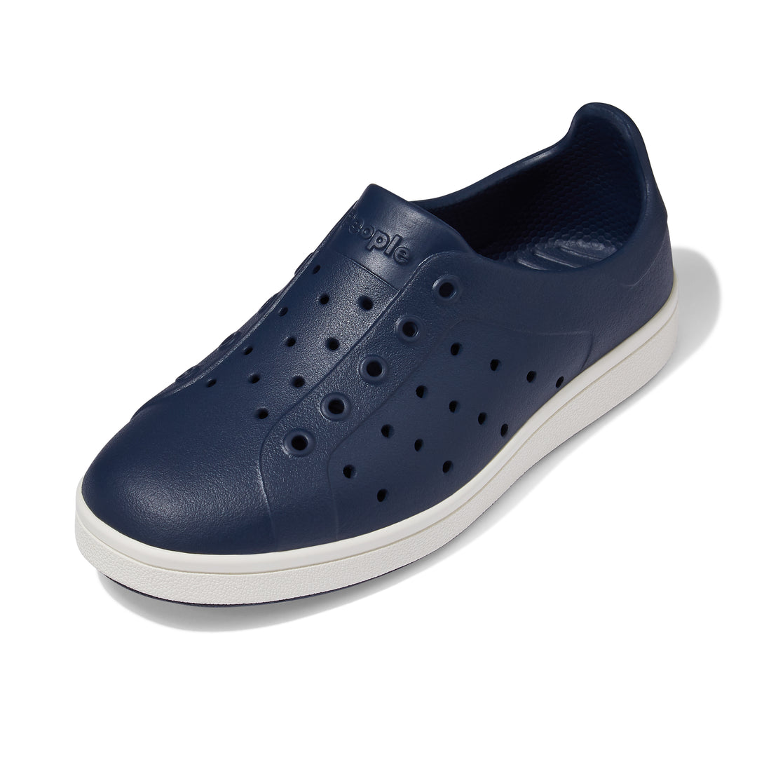 A People Footwear Ace Kids' Slip On Shoe with breathable holes on the sole.