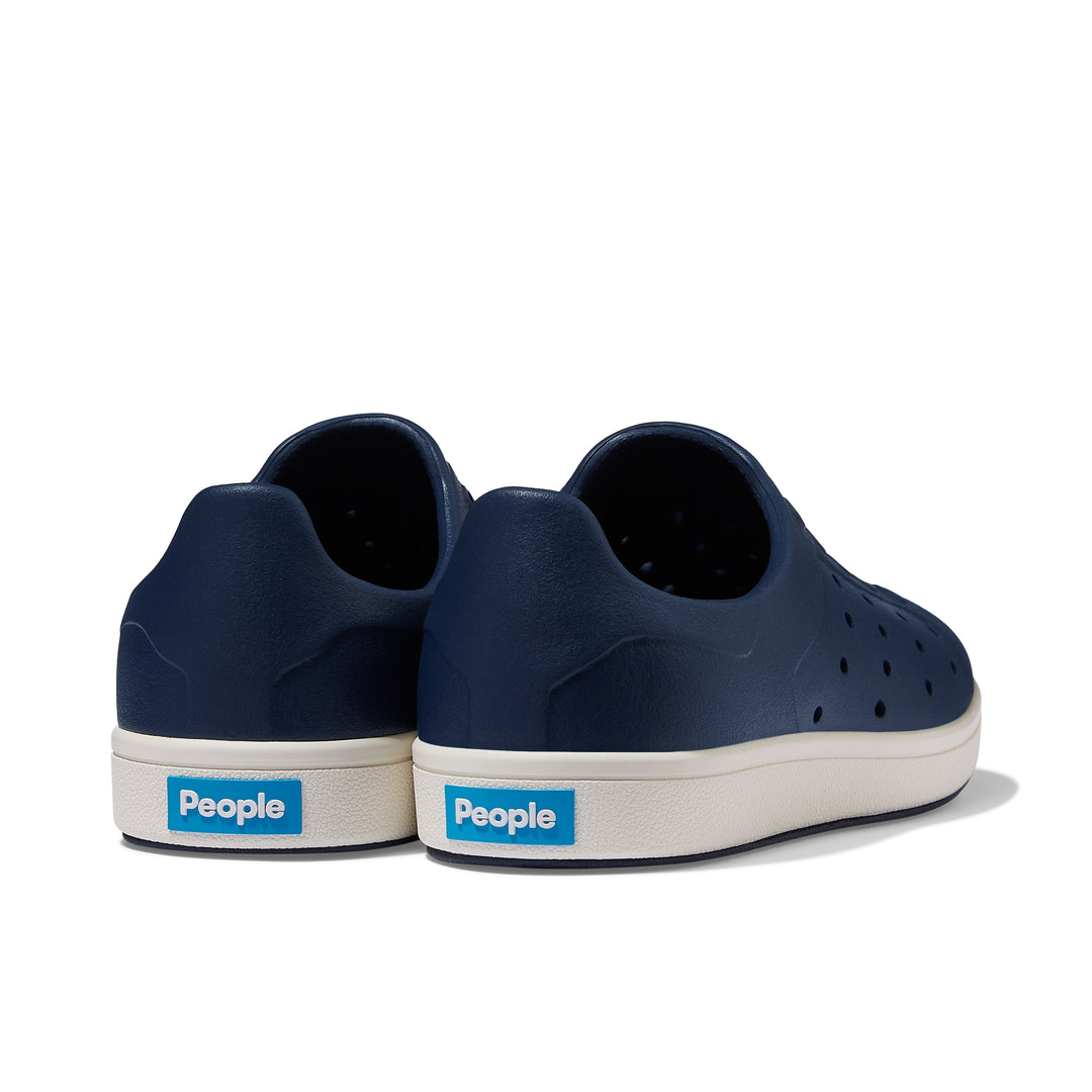 A pair of People Footwear Ace Kids' Slip On Shoes that are breathable and slip-resistant.