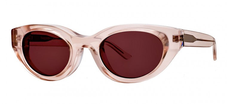 Thierry Lasry Acidity Sunglasses by Thierry Lasry feature translucent pink frames with dark lenses that offer UV protection.