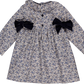 The Kidiwi Baby Girls' and Girls' Adriana Corduroy Bows Smocked Dress features long sleeves, a collar, floral pattern, and two large black waist bows, shown flat on a white background.