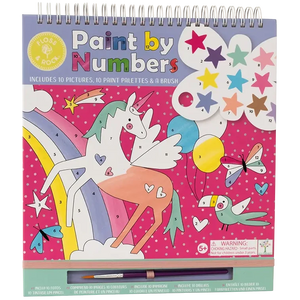 The Floss and Rock Fantasy Paint By Numbers kit is a spiral-bound art set for kids ages 5 and up, featuring a vibrant pink background with polka dots, and playful designs including a colorful unicorn, rainbow, stars, bird, and paintbrush.