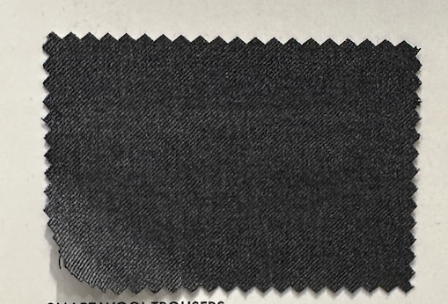 A rectangular swatch of dark gray fabric from the Samuelsohn Slim Fit Flat Front Wool Pants, featuring an unfinished hem and pinked edges, is displayed on a light background.