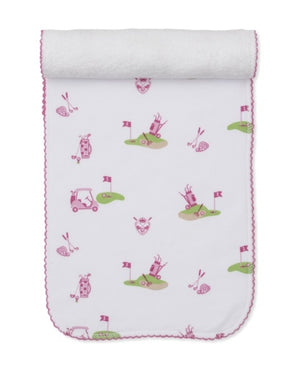 The Kissy Kissy Golf Championship Burp Cloth in pink and green features golf bags, carts, flags, and clubs—pair it with our matching white baby blanket for a perfect gift from our Golf Championship Collection.