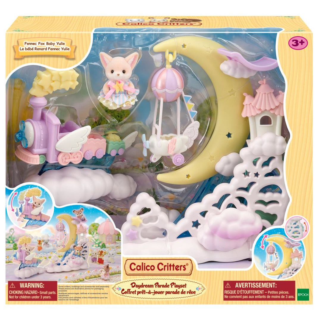 The Calico Critters Daydream Parade Playset in packaging includes a cat figure, moon float, steam train, and pastel clouds, designed for children ages 3 and up.