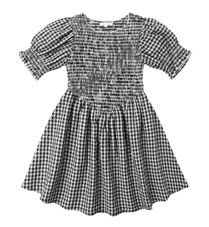 The Girls' Louise Dress by Rylee & Cru features black and white gingham, short puff sleeves, a shirred smocked bodice, and a gathered flared skirt, shown laid flat on a white background.