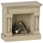 The Maileg Fireplace, Mouse - Off White is a small, wooden model fireplace with a vintage finish and faux logs inside the firebox—perfect for adding charm to your miniature home.