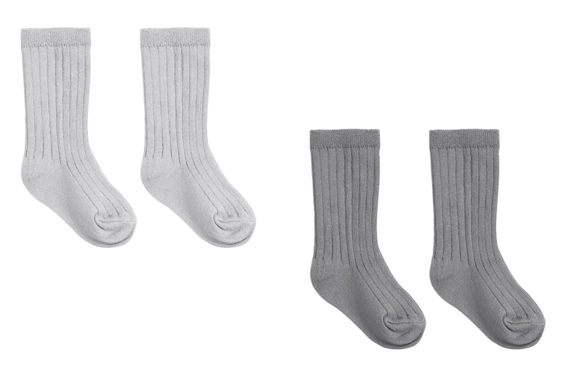 Two pairs of cozy, ribbed Baby Socks from Quincy Mae are displayed side by side on a white background—one pair in light gray and the other in dark gray. This stylish Quincy Mae boxed set is perfect for adding comfort to your little one’s daily routine.