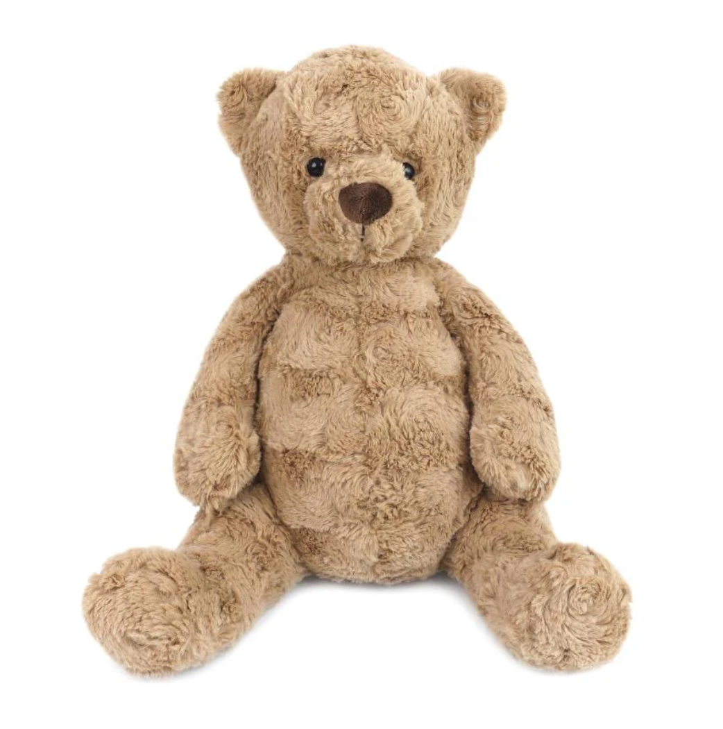 The Mon Ami Huggie Bear, an ultra-soft brown plush teddy bear, sits upright with its legs spread out and arms relaxed at its sides against a white background, making it the perfect cuddly children’s stuffed animal.
