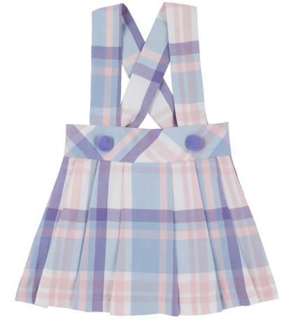 The Beaufort Bonnet Company's Girls' Pearl Prep Skirt features a pastel Peach Blossom Plaid in blue, pink, and purple, with pleats, crossed suspenders, and two decorative buttons on the waistband.