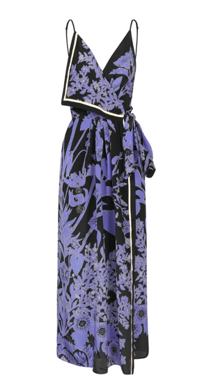 The Nouvel Arome Maxi Dress by Johanna Ortiz is a sleeveless black wrap dress with thin straps, a deep V neckline, and a purple floral print, featuring a side tie and decorative trim.