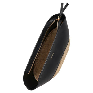 A top view of the Altuzarra Basket Clutch showcases its woven construction, black leather trim, zippered closure, and gold printed brand name on the front.