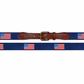 Navy dog collar featuring multiple American flags and an Italian leather patch with a metal buckle by Smathers & Branson.