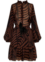 The Andres Otalora Roa Mini Dress by Andres Otalora is a zebra-print sheer dress in shades of brown and black, made from recycled polyester. It features a v-neck, long sleeves, ruffled neckline, button details, and an A-line silhouette with a tiered skirt.