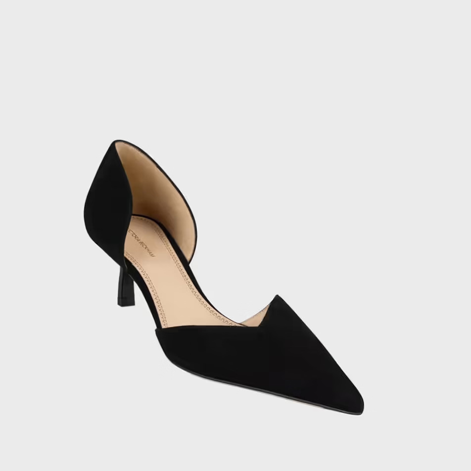 Victoria Beckham Victoria Angle D’Orsay Pump 55 Suede, a black suede pump featuring a pointed toe, V neckline, and a kitten heel.