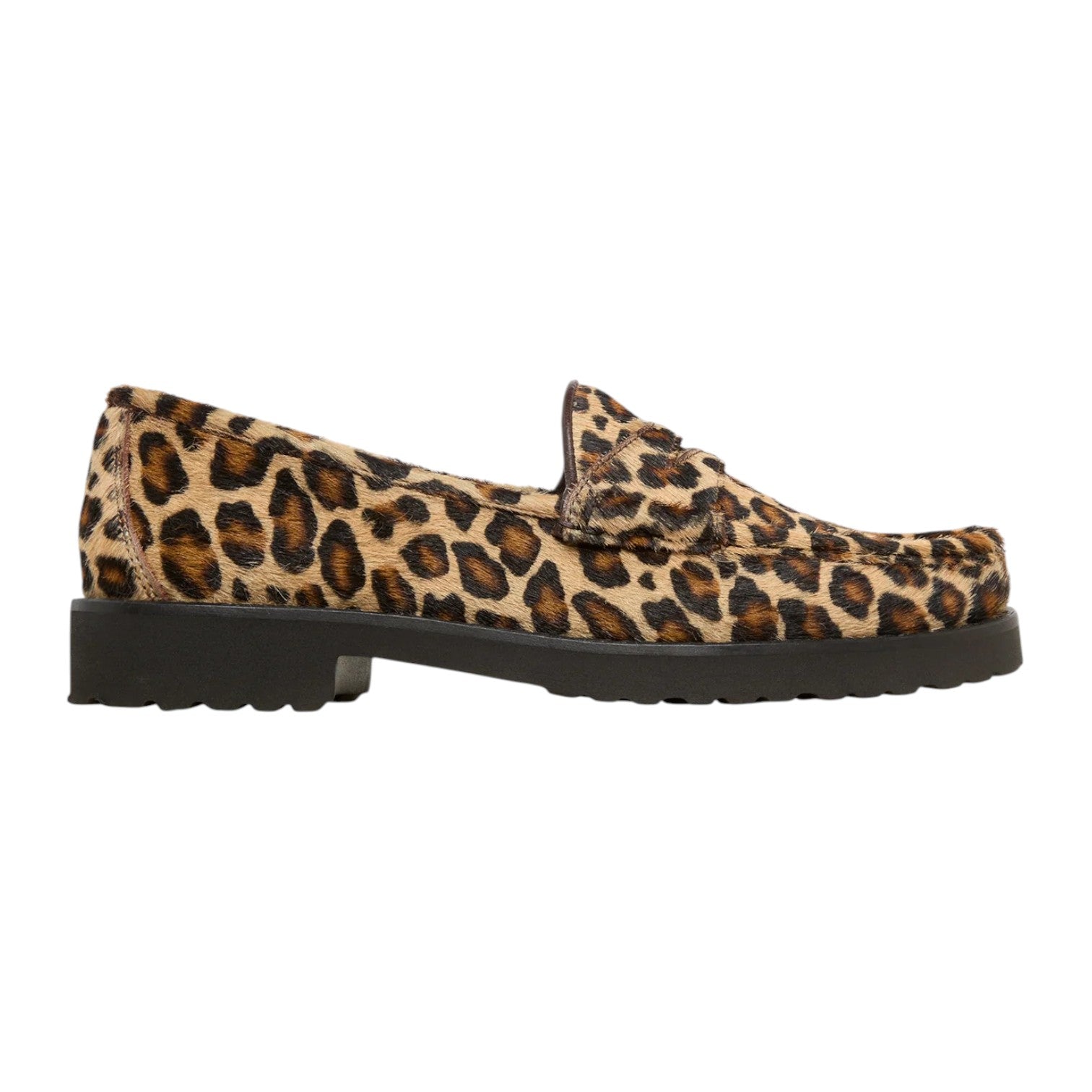 The Ann Mashburn Lug Sole Loafer features a leopard print and thick black base, shown in a left-facing side view—ideal for adding bold '90s-inspired style to your outfit.