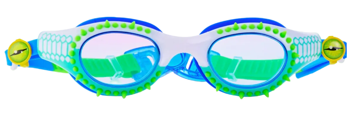 Bling2O’s Kids' Jurassic Dive Goggles feature playful blue and green frames accented with decorative spikes and cartoon eyes on the sides, capturing a whimsical prehistoric style—making them the ideal swim accessory for kids, as shown against a white background.