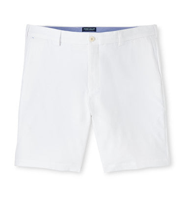 The Peter Millar Surge Short: white, knee-length, water-resistant shorts with belt loops, front pockets, and a button closure—versatile performance apparel for any activity.
