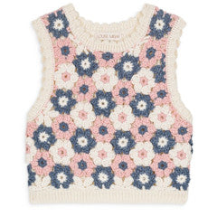 The Girls' Rynia Vest by Louise Misha is a sleeveless crochet crop top with a floral pattern in cream, blue, and pink, plus scalloped neckline and armholes—a playful update to the classic cotton-blend sweater vest.