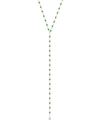 Introducing the Gigi Clozeau Party Y Necklace 19.7", a stunning piece showcasing a gold lariat design embellished with green beads and an eye-catching round pendant, enhanced by elegant resin pearls from the renowned brand Gigi Clozeau.